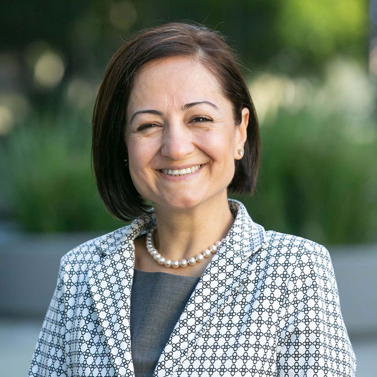 Portrait of Ayse, Wealth Advisor supporting client relationships and personalized financial planning services at Bluespring Wealth California