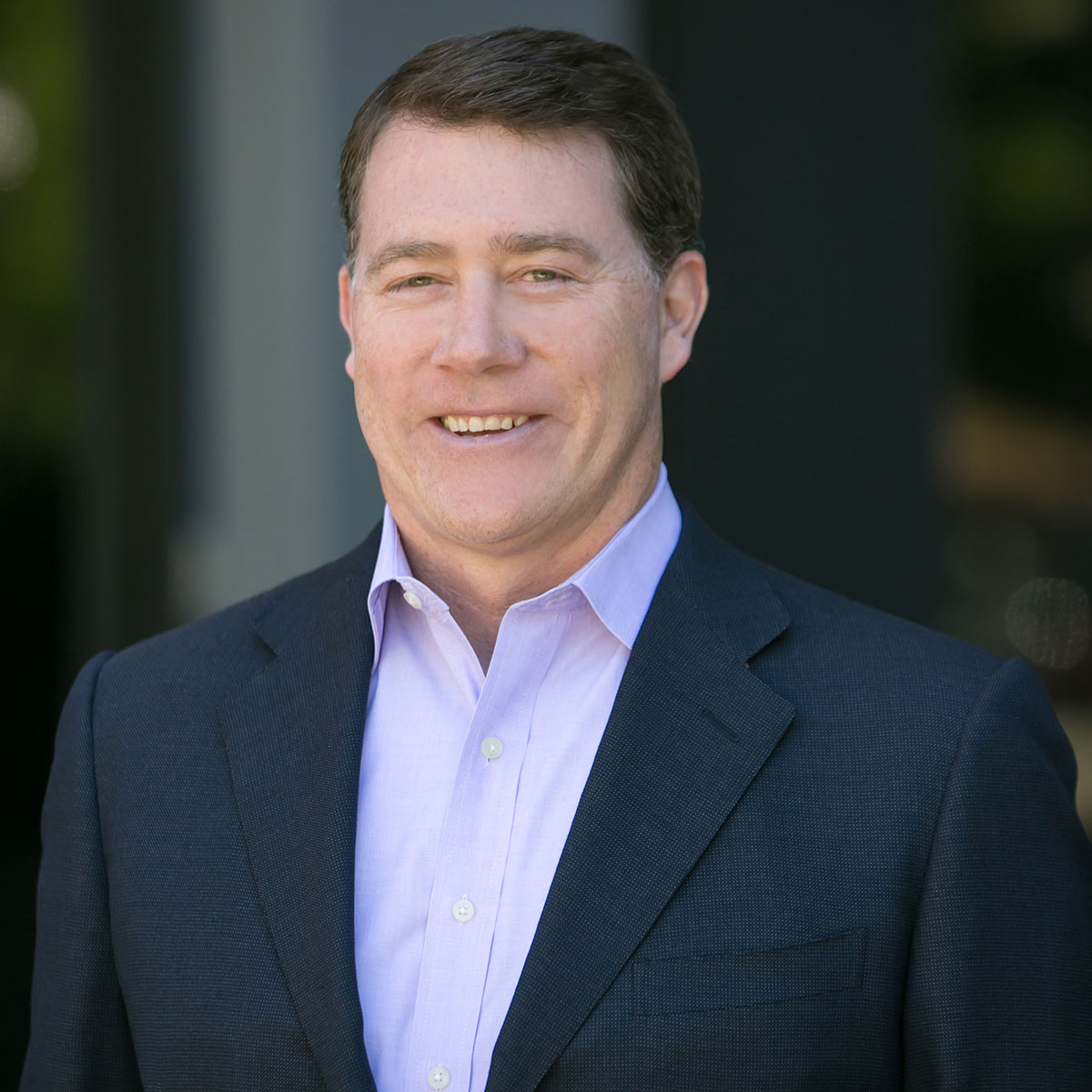 Portrait of John Edelen, Wealth Advisor providing retirement planning and investment guidance at Bluespring Wealth California