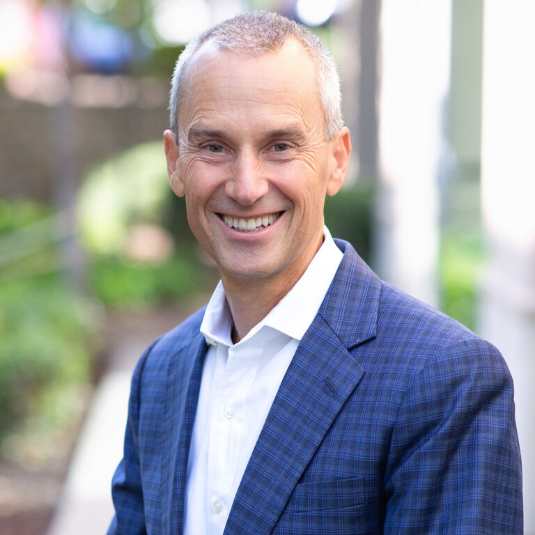 Portrait of Michael Smith, Wealth Advisor providing financial planning and investment guidance for individuals and business owners at Bluespring Wealth California