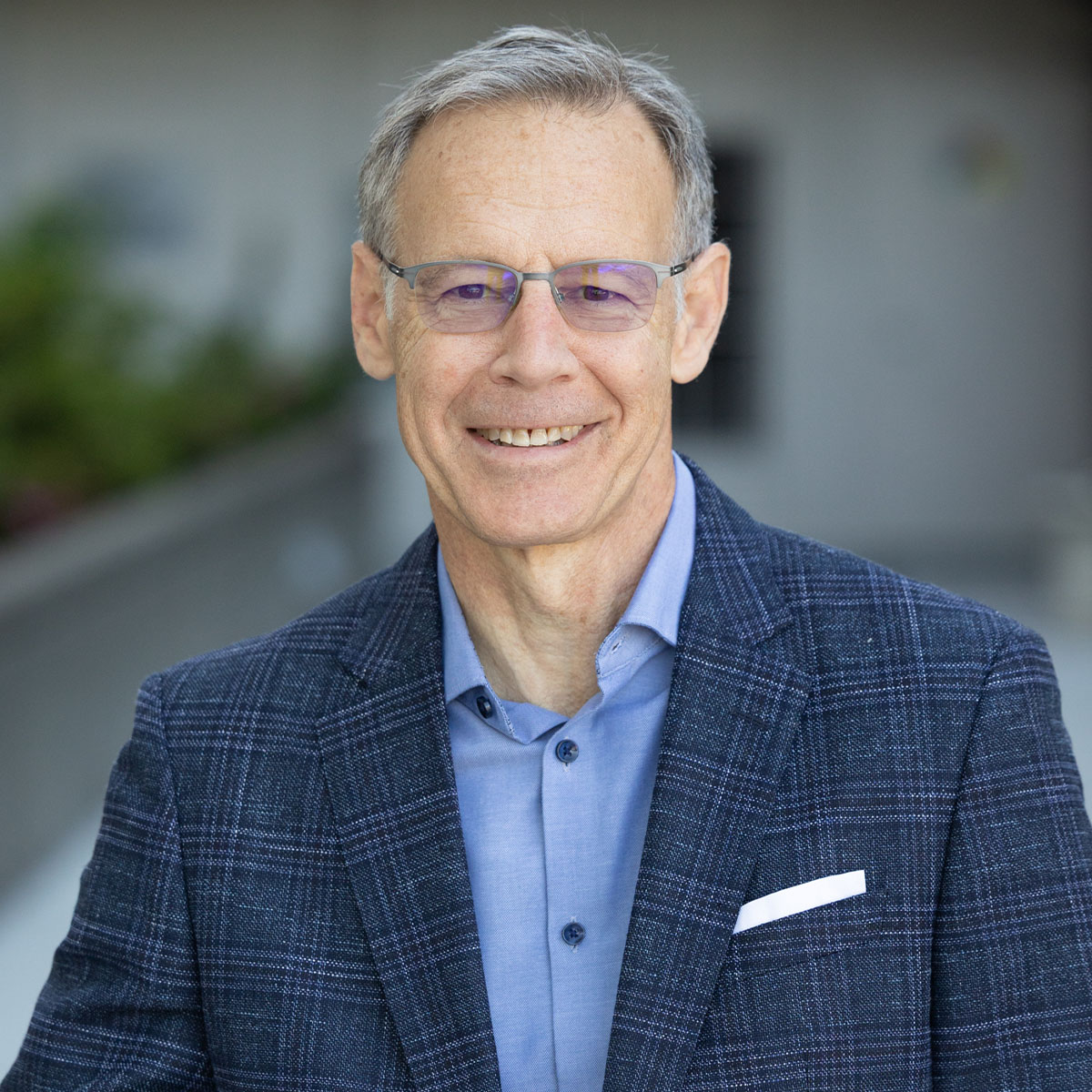 Portrait of Richard Brown, Chief Investment Officer overseeing investment research and portfolio strategy at Bluespring Wealth California