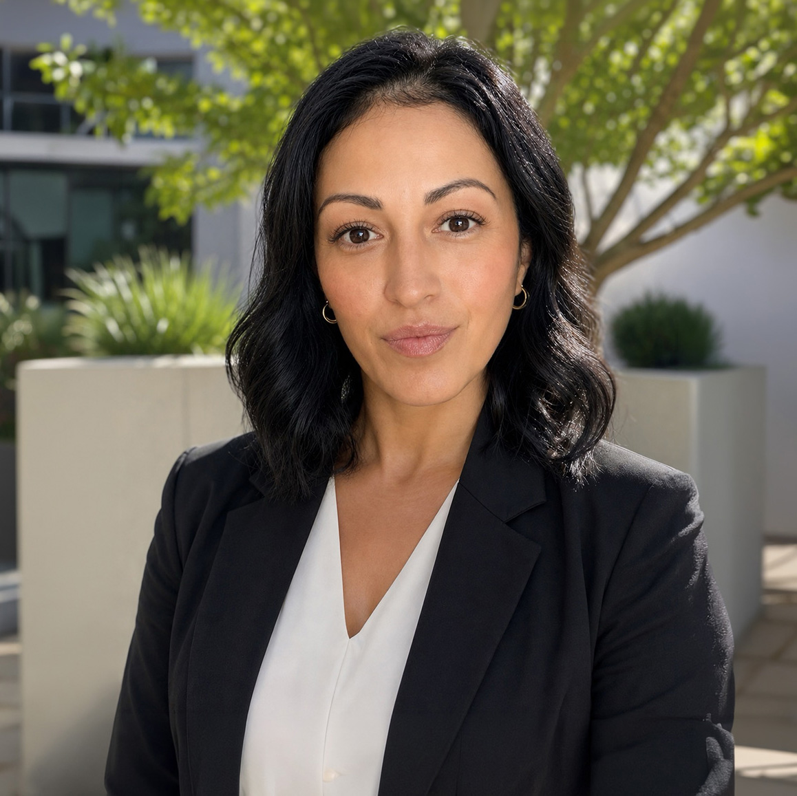 Portrait of Yezmin, Wealth Advisor supporting personalized financial planning and client relationship services at Bluespring Wealth California