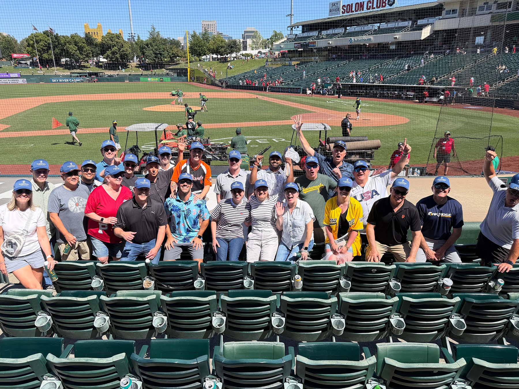 Company culture and community event photo representing team camaraderie, client appreciation events, and relationship-driven culture