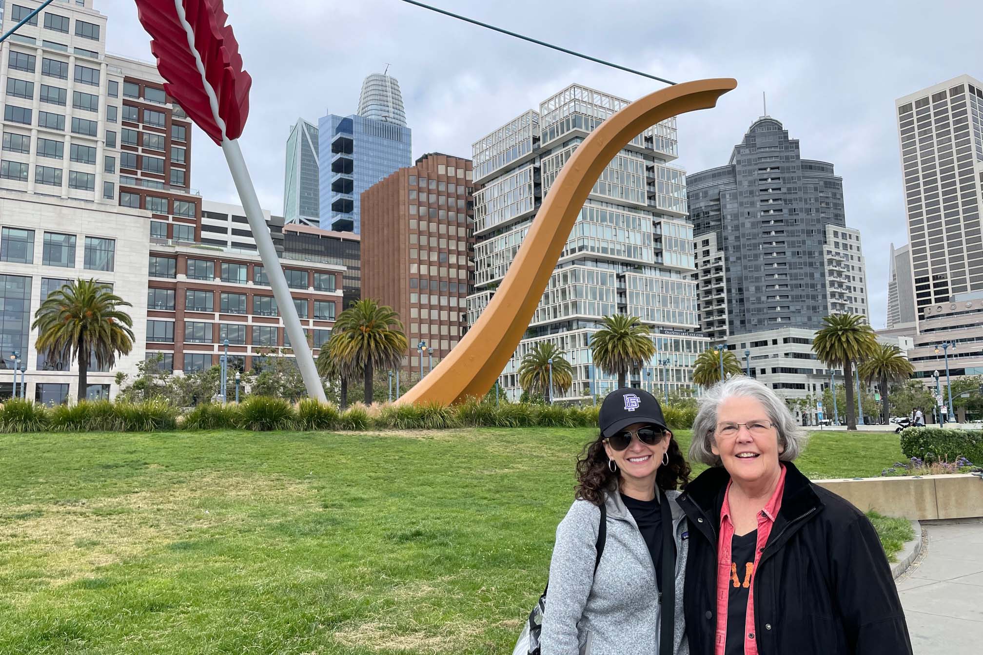 Two women visiting a San Francisco landmark representing multigenerational travel, family connection, urban exploration, and enjoying meaningful experiences together